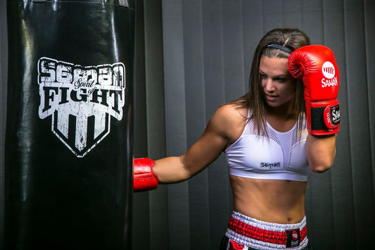 What are the options for breast protection in combat sports